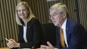 International Olympic Committee (IOC) outgoing President Thomas Bach (R) speaks next to the President-elect Kirsty Coventry at the opening of the executive board meeting of the IOC, at the Olympic House, Lausanne, Switzerland, April 9, 2025. (AP Photo)