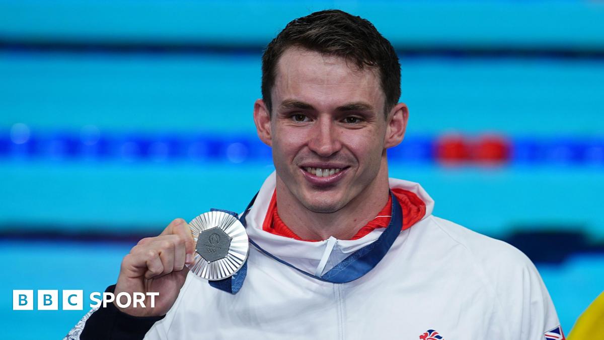 Benjamin Proud poses with his 50m freestyle silver medal from the 2024 Paris Olympics