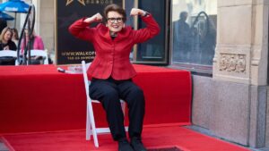 Sports icon Billie Jean King flexes her muscles during the Hollywood Walk of Fame star ceremony honoring King in Los Angeles, California, U.S., April 7, 2025. (EPA Photo)