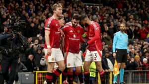 Manchester United's Bruno Fernandes (C) celebrates with teammates after scoring his third goal during the UEFA Europa League round of 16, 2nd leg match against Real Sociedad, Manchester, U.K., March 13, 2025. (EPA Photo)