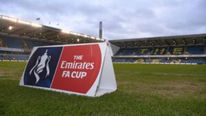 A photo of The Den stadium home of Millwall Football Club with an FA Cup sign visible