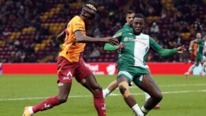 Galatasaray's Victor Osimhen (L) in action with Konyaspor's Hamidou Keyta during the Turkish match at the RAMS Park, Istanbul, Türkiye, Feb. 20, 2025. (IHA Photo)