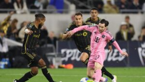 Inter Miami's Lionel Messi (R) battles for possession against LAFC players during the CONCACAF Champions Cup 2025 quarterfinal first leg match at BMO Stadium, Los Angeles, U.S., April 2, 2025. (AFP Photo)
