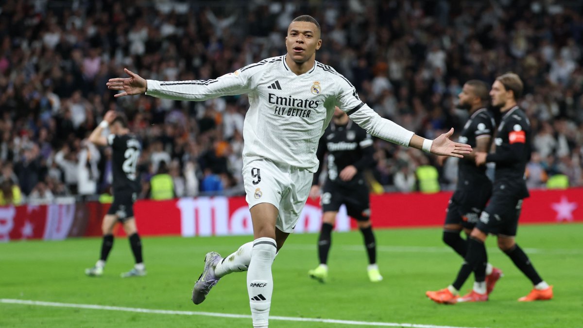 Real Madrid's Kylian Mbappe celebrates after converting a penalty to score their first goal during the Spanish league football match  Leganes at the Bernabeu stadium, Madrid, Spain, March 29, 2025. (AFP Photo)