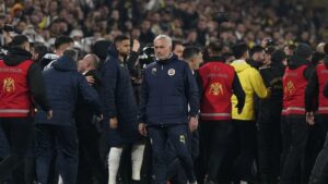 Fenerbahçe coach Jose Mourinho (L) reacts as players clash during the Turkish Cup quarterfinal match against Galatasaray at the Ülker Stadium, Istanbul, Türkiye, April 2, 2025. (IHA Photo)