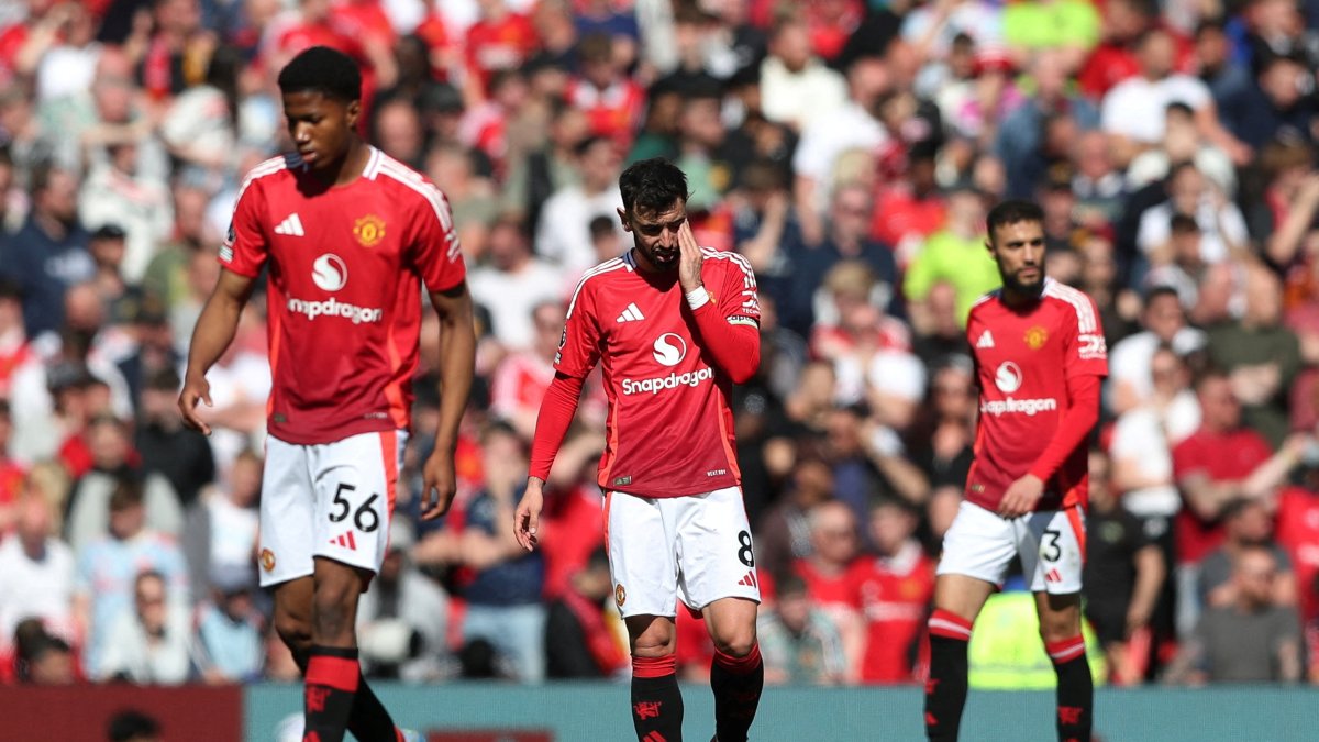 Manchester United's Bruno Fernandes (C) looks dejected after Wolverhampton Wanderers' Pablo Sarabia scores their first goal during the Premier League match at Old Trafford, Manchester, U.K., April 20, 2025. (Reuters Photo)