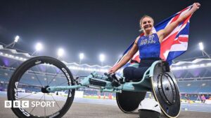 Melanie Woods celebrating with the Union Jack.